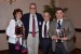 Dr. Nagib Callaos and Prof. Andrés Tremante giving Prof. Gabriela Vilanova and Prof. Jorge Varas a plaque "Por su Excelente Ponencia Plenaria."